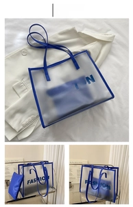 Blue semi-transparent frosted tote bag with fashion text and matching inner zipper pouch