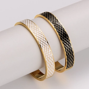304 stainless steel enamel cuff bangle with geometric diamond pattern in black and white