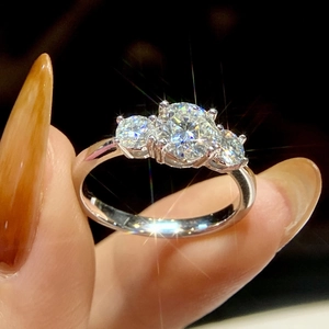 Classic three-stone moissanite engagement ring in 925 sterling silver with round cut stones