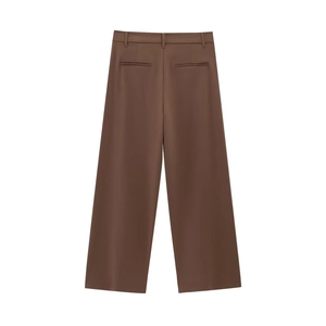 Detailed back view of brown wide-leg suit trousers with classic welt pockets and belt loops