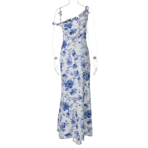 Detailed view of the blue floral print and slim-fit waist on the white one-shoulder maxi dress