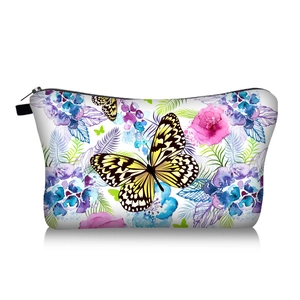 Detailed view of white butterfly floral makeup bag with high-quality printing and zipper