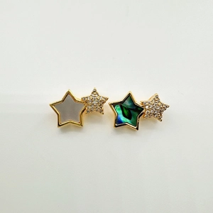 Star-shaped gold-plated earrings with natural shell inlay and sparkling rhinestones