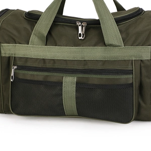 Detailed view of army green travel bag with mesh pocket and sturdy zipper closure