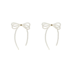 Elegant white pearl bow earrings with gold metal beads on a clean white background
