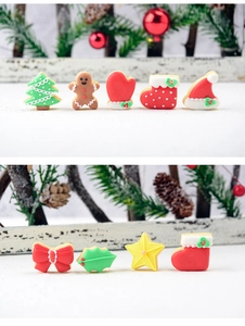 Detailed view of Christmas cookie cutters including gingerbread man and tree shapes