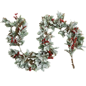 Artificial Christmas garland with flocked lamb ear leaves and vibrant red berry clusters