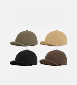 Detail showing four colors of soft cotton miki hats in green, khaki, black and brown