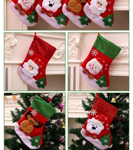 Close-up of four festive Christmas stockings featuring Santa, Snowman, Reindeer and Bear
