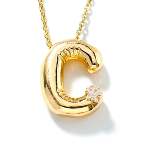 Golden 3D balloon style letter C pendant necklace with a small star cubic zirconia
