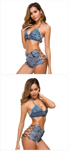 Detail eines Denim-Zweiteilers mit Neckholder-Top und seitlich geschnürten Hotpants