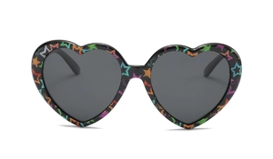 Detail of heart-shaped sunglasses with black frames and colorful graffiti star patterns