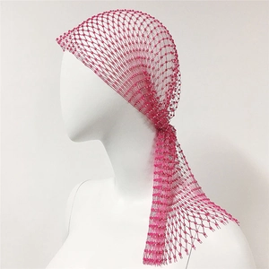 Detail of rose red mesh headscarf with crystal beads and long fringe for festival parties