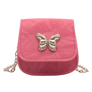 Chic pink pleated crossbody bag with silver butterfly accent and chain strap for women