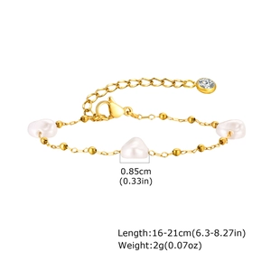 Detail view of gold beaded bracelet with baroque pearls and length specifications
