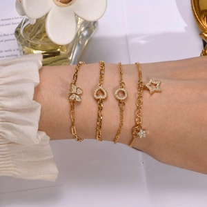 Elegant 4-piece 18K gold-plated bracelet set with zircon butterfly and heart charms