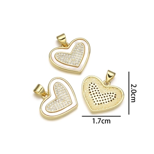 Detailed view of 2.0cm x 1.7cm heart pendant with white inlay and gold grid back