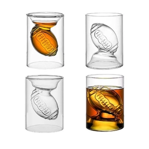 Set of four double-walled glass shot cups with unique rugby ball shaped inner design