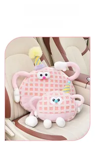 Close-up of pink lamb wool monster car headrest with waffle texture and cute hat