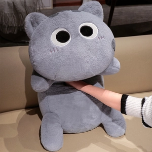 Plush grey cat pillow detail showing the hand warmer function and soft faux fur texture