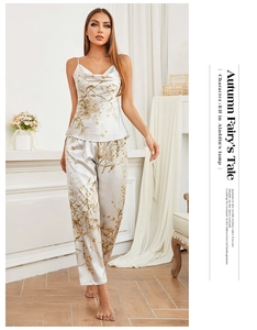 Detailed view of the silky floral print pajama set including camisole top and trousers