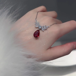 Elegant silver necklace with red teardrop zircon pendant and sparking stones