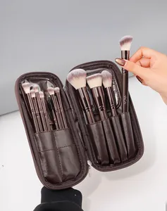 Close-up of 12pcs brown makeup brush set with soft bristles and premium PU zipper pouch