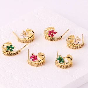 Detailed close-up of gold-plated plum blossom stud earrings with colorful zircon stones
