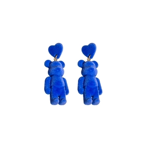 Blue flocked heart and 3D bear earrings with gold finish on a clean white background