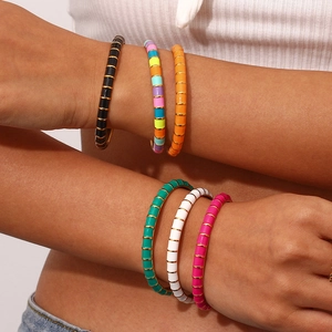 Minimalist 18K gold plated stainless steel enamel bangles in six vibrant colors for women