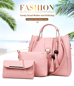 Detailed view of pink 3-piece handbag set with tote, pouch, clutch and bead tassel