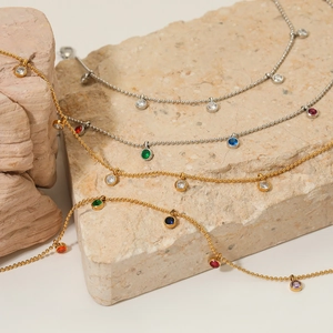 Chic stainless steel anklets in gold and silver with colorful zircon crystals on stone