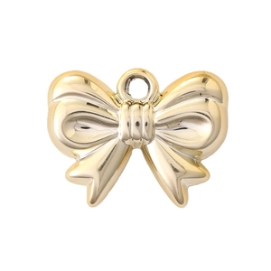 UV gold plated bow tie pendant charm with polished metallic luster on white background