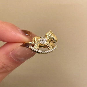 Golden rocking horse open ring with sparkling white cubic zirconia stones for women