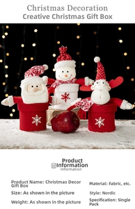 Close-up of Nordic knitted Christmas gift boxes featuring Santa, Snowman and Reindeer