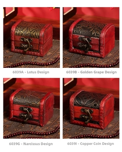 Detailed views of vintage wooden jewelry boxes with antique floral embossed designs