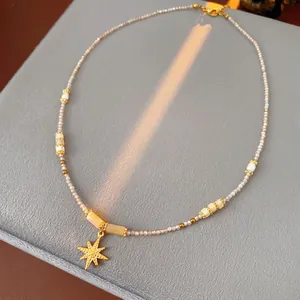 Titanium steel starburst pendant necklace with freshwater pearls and grey beaded chain