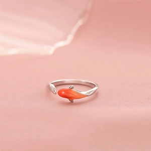 Detail of S925 sterling silver ring with orange koi fish enamel and polished finish