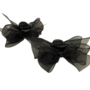Set of two black mesh bow hair claws in Japanese style for elegant side hair styling