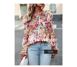 Detail of floral printed shirt showing smocked neckline and ruffled cuffs for women
