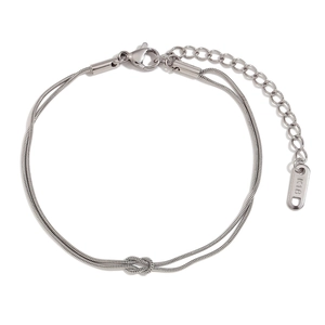 Elegant silver-tone double-layer snake chain bracelet featuring a minimalist knot center