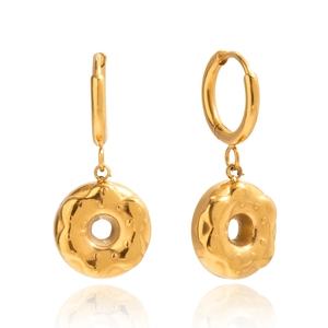 Detail of golden donut-shaped hoop earrings with unique wave texture and 3D dot patterns