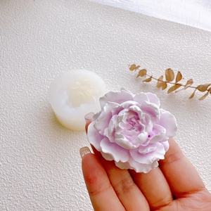 3D jasmine flower silicone mold with lavender scented candle and craft tools