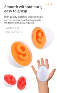 Close-up of number matching educational toy eggs with smooth orange and red interiors