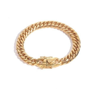 7mm gold plated stainless steel Cuban link bracelet with dragon clasp on white background