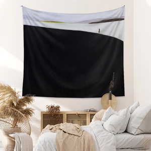 Minimalist bohemian landscape tapestry with abstract scenery used as bedroom wall decor