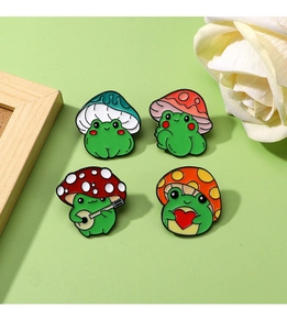 Macro view of four green frog pins wearing colorful mushroom hats and playing instruments