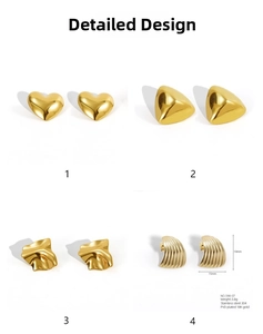 Detail of four gold 18K PVD plated stainless steel earrings in heart and geometric shapes