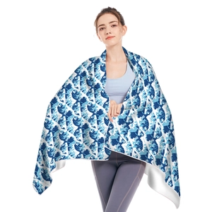 Detail of Great Wave printed microfiber towel showing vibrant sea wave patterns