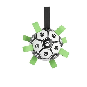 Interactive dog soccer ball with nylon grab tabs and paw print pattern for fetch training